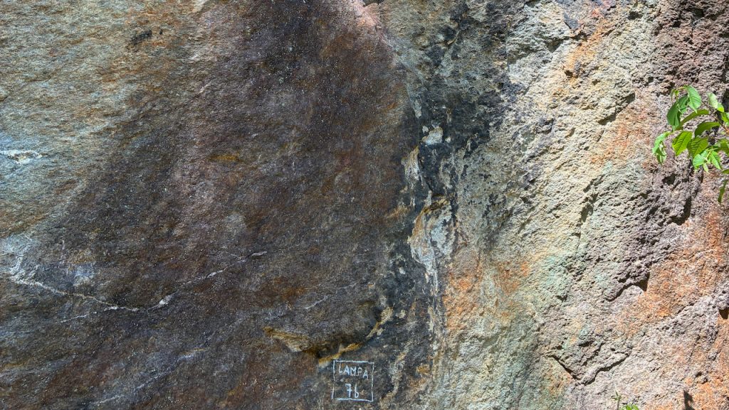 Climbing wall old weathered rock